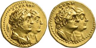 Double-sided gold coin. On the left and right, both sides of the coin depict Ptolemy II donned in robes and wearing a diadem and facing the right while Arsinoe II, draped and diademed faces the same direction behind him.