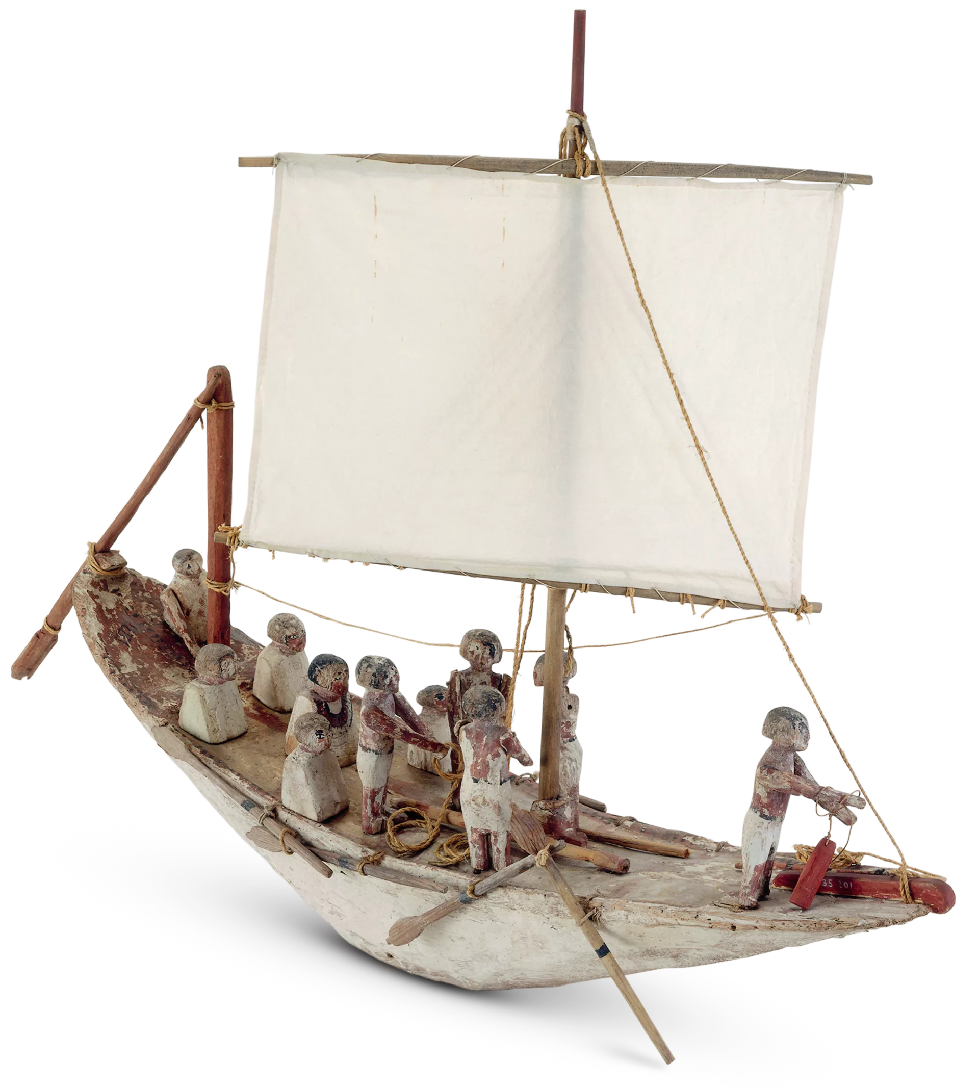 Model of an Ancient Egyptian nile ship. Skinny hull with bow and stern curving out of the water with a single sail. 