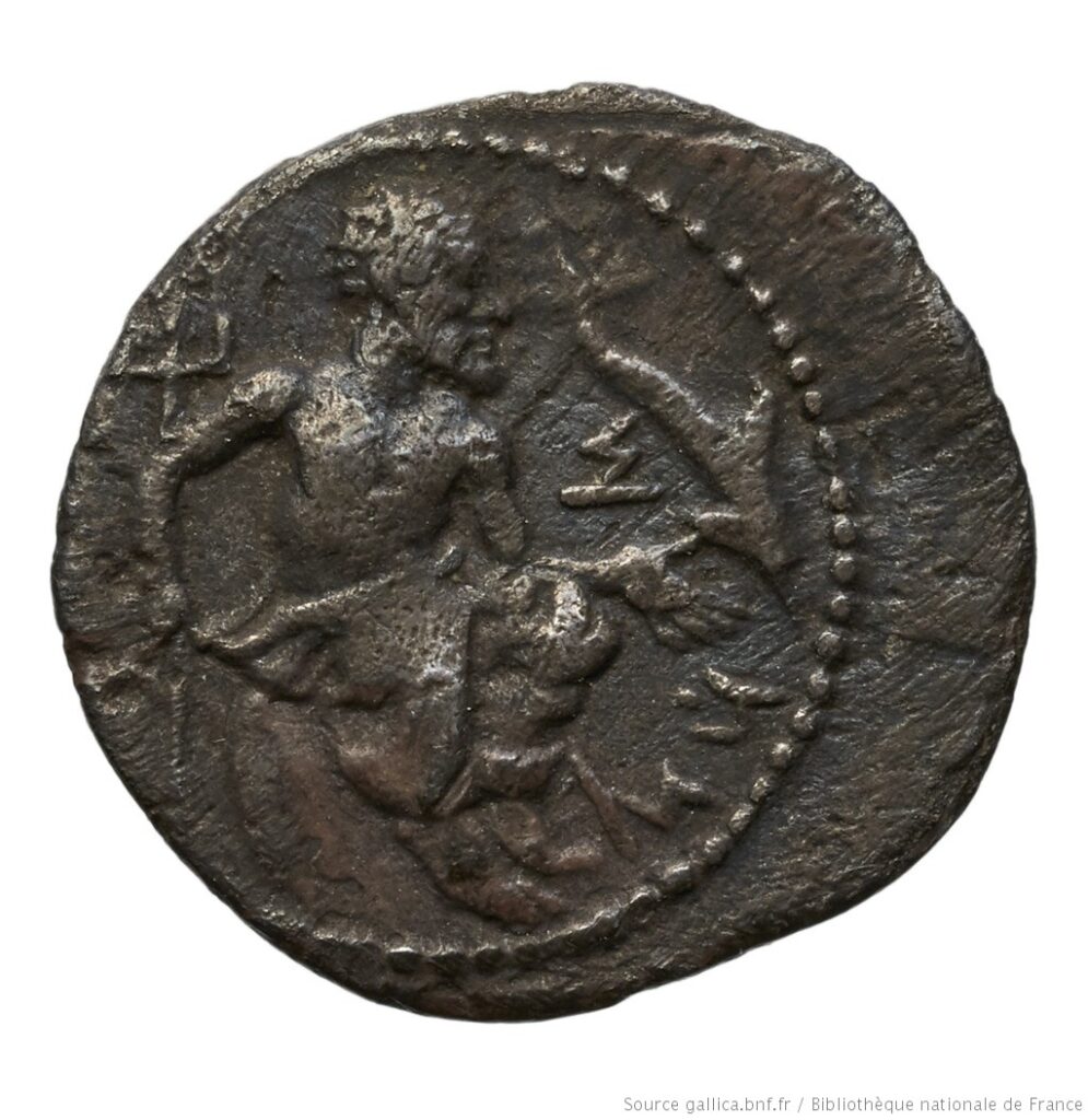 Poseidon, siting and holding a trident in his left hand, and a dolphin, which is by Poseidon right hand, with the Punic word Sys visible 